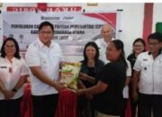 Ratusan Keluarga Terdampak Banjir di Kecamatan Liktim Terima Bantuan Pangan dari Pemkab Minut