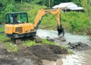 Pemkab Minut Kerahkan Alat Berat dan Salurkan Bantuan untuk Warga