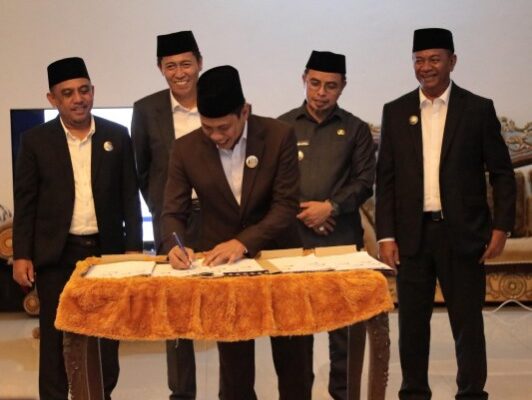 Wali Kota Kotamobagu Weny Gaib Teken MoU Bersama Bupati Se-BMR