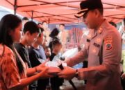 Kapolres Kotamobagu Serahkan Bantuan Kepada Warga Korban Kebakaran