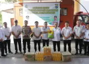 Wali Kota Kotamobagu Weny Gaib Serahkan Bantuan Kepada Masyarakat Korban Banjir di Bolmong