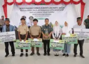 Wali Kota Kotamobagu Weny Gaib Serahkan Bantuan Anak Asuh dan Rumah Ibadah