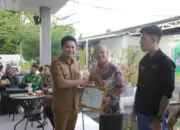Pemkot Kotamobagu Serahkan Piagam Penghargaan Kepada Wajib Pajak Terbaik 2025